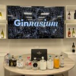 Una foto in cui sono esposte le bottiglie di Gin che sono state ideate e prodotte per il progetto GINnasium sul neuromarketing del'etichetta.